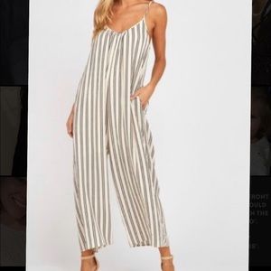 Striped spaghetti strapped jumpsuit NWOT, size M/L